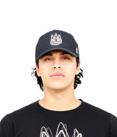 CULT OF INDIVIDUALITY Mesh Back Trucker Black Crown with Black Mesh at Gravity NYC